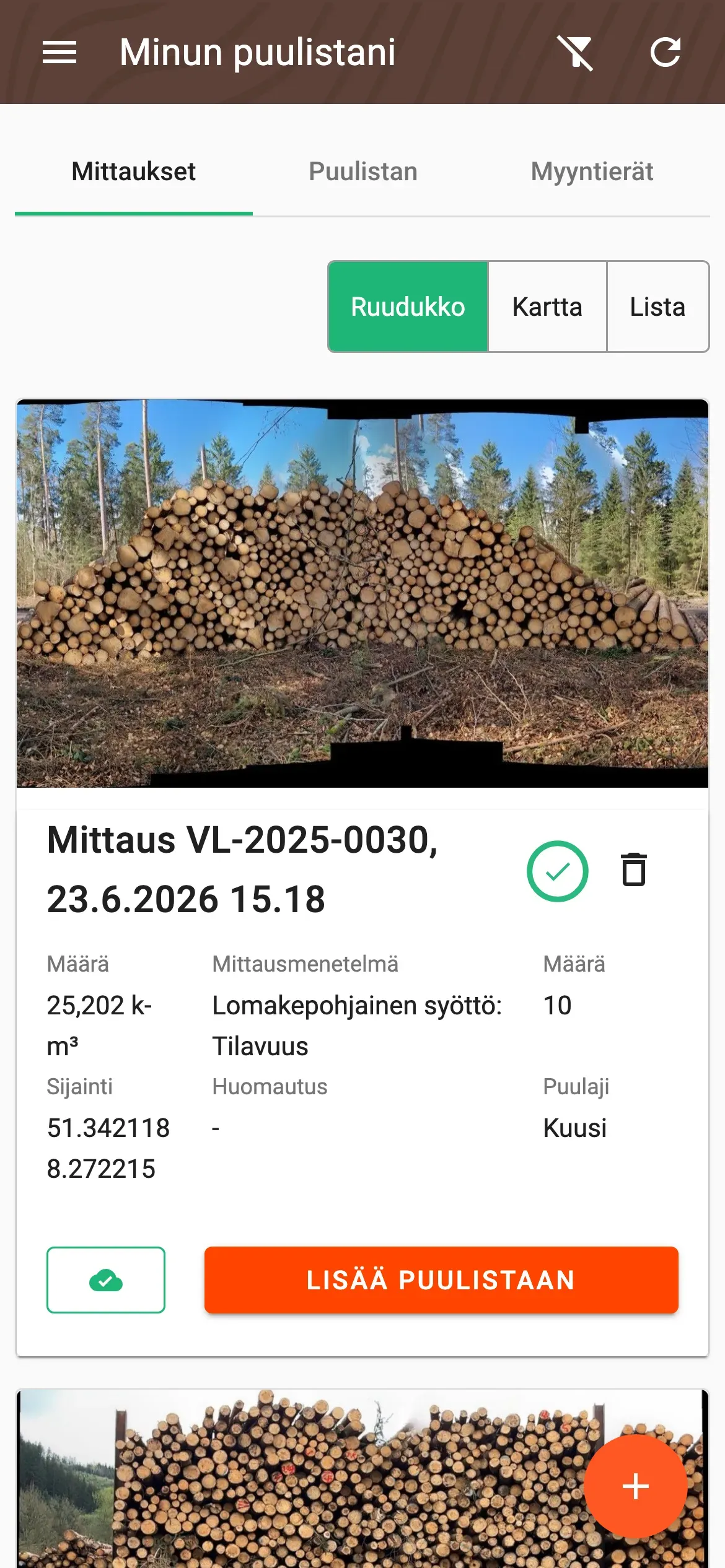 Mittauslista ruudukkonäkymässä, jossa toimitustilan ilmaisin jokaisen mittauksen kohdalla